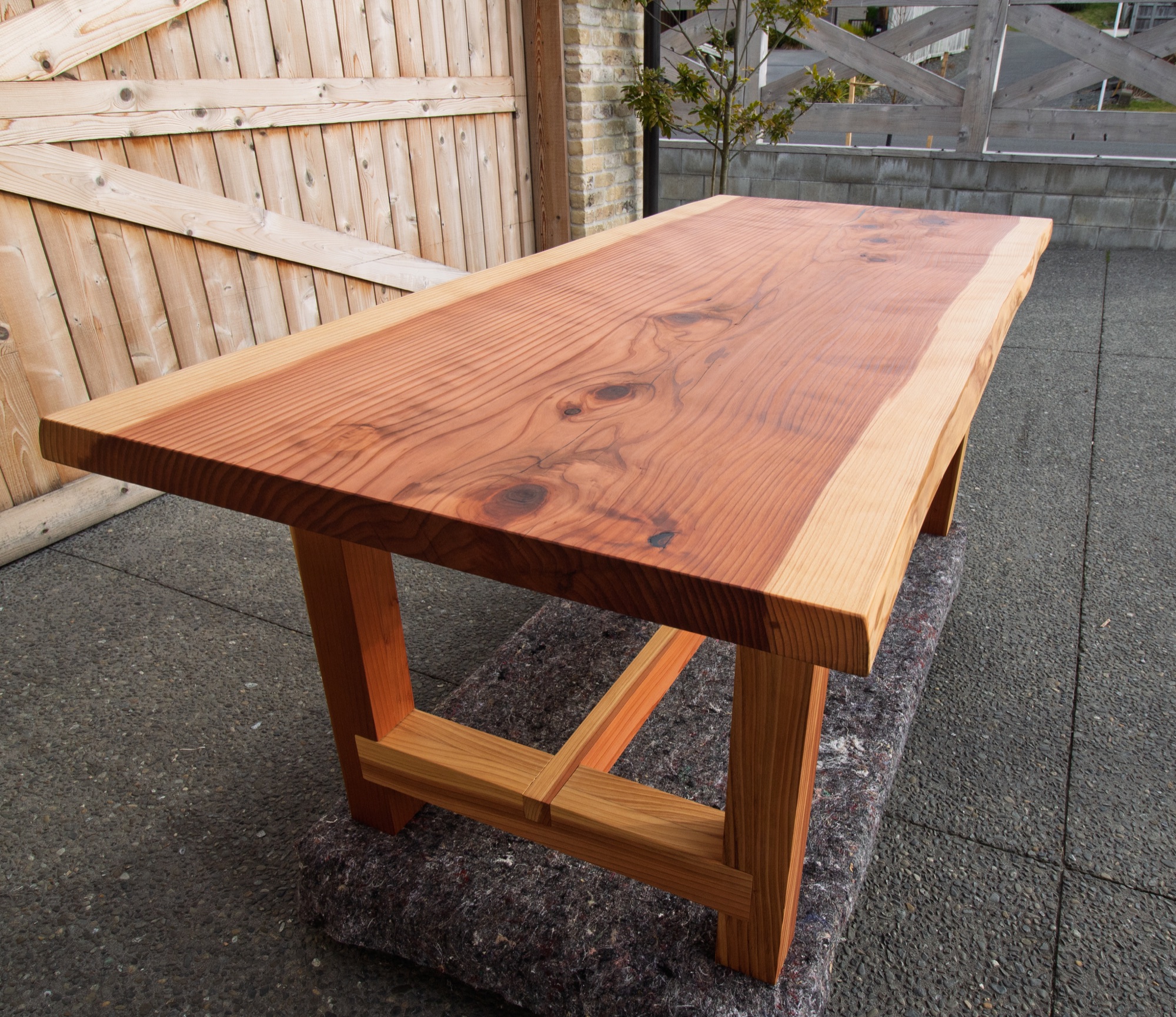 Long grain across the New Zealand grown Redwood tabletop