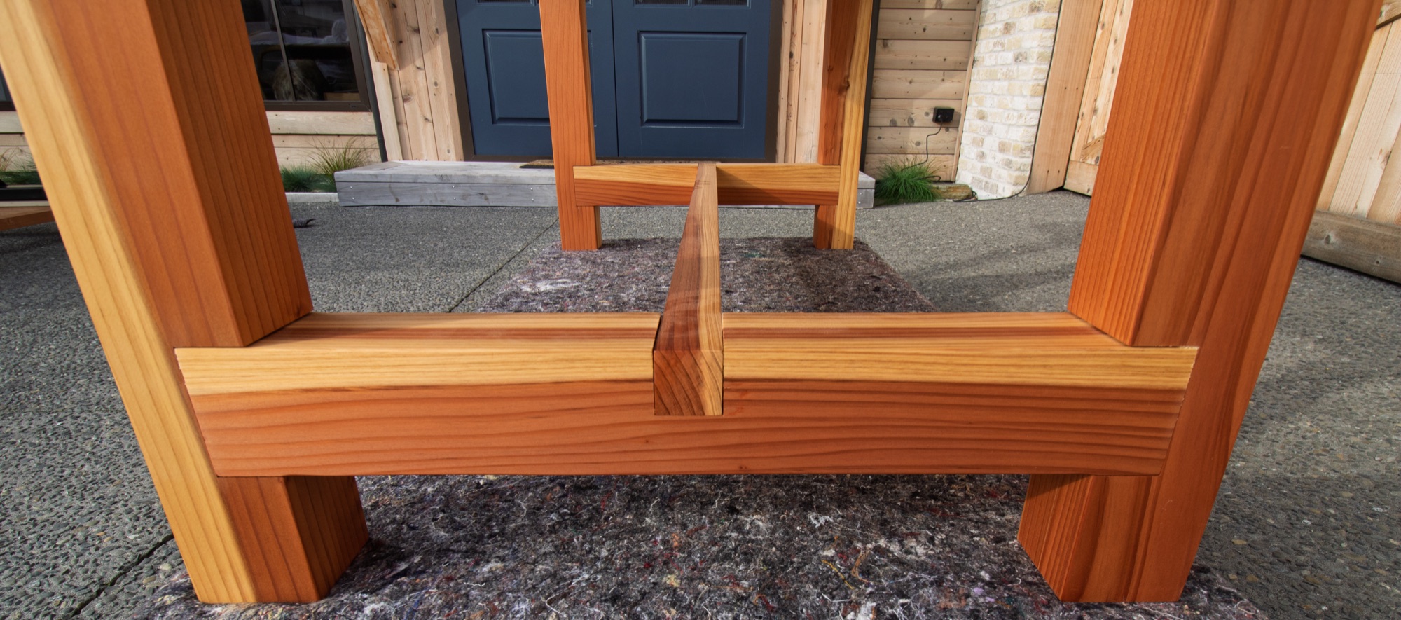 Exposed timber joinery in the Rotorua Redwood table base